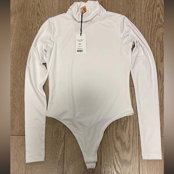 Brand new Smash and Tess turtleneck bodysuit 3XS. - Picture 1 of 1